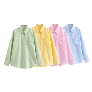 Detailed flat lay of striped long sleeve shirts in green, yellow, pink and blue colors