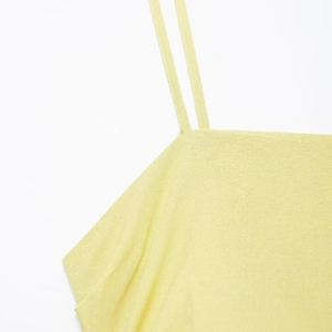 Women's summer light yellow midi dress with slim double straps and minimalist neckline