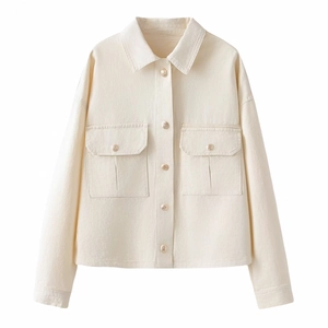 Women's cream-colored cropped denim jacket with classic collar and front flap pockets