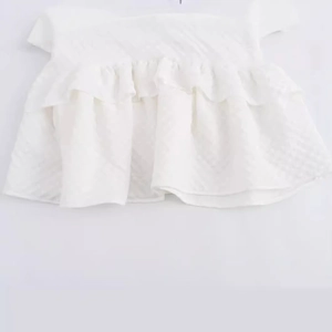 White puff sleeve ruffle top with textured checkered fabric for women's summer style