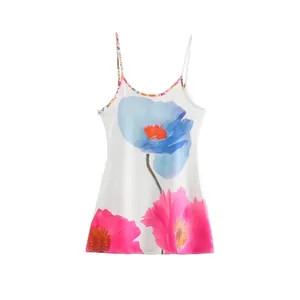 White floral print camisole summer dress with blue tropical flowers and thin straps