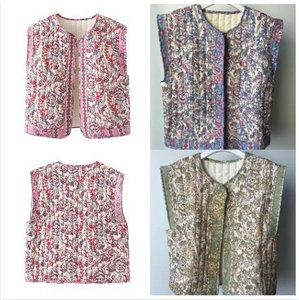 Women's bohemian floral quilted vest with open front and sleeveless ethnic print design