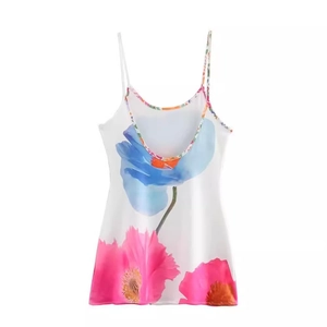 Women's summer floral camisole top with pink and blue blossoms on a white background