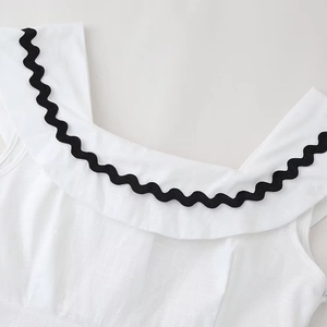 White cotton linen dress for women with black wave trim and wide vintage collar