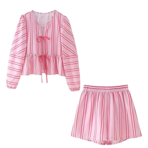 Women's summer set featuring pink and white striped tie-front top and matching shorts
