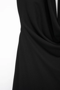 Detail of the elegant draped cowl neckline on this soft black fabric summer dress