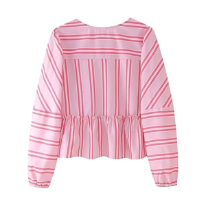 Flat lay back view of pink striped peplum shirt with elastic cuffs and ruffled hemline