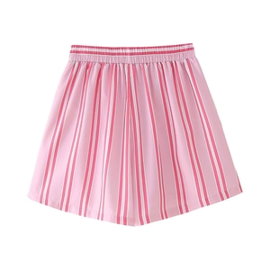 Flat lay of pink vertical striped high-waist summer shorts with elastic waistband