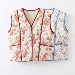 Women's quilted floral vest with V-neck and pockets in blue and orange colors