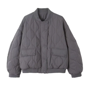 Women's grey quilted bomber jacket with gourd pattern stitching and metal snap buttons