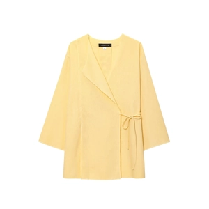 Detail of light yellow linen wrap top showing V-neck and branded label with size S