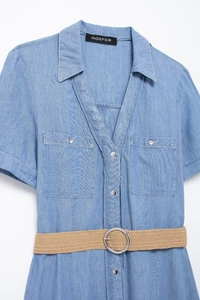 Detail shot of blue denim midi dress with a woven belt and silver metallic buttons