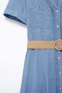 Detailed close-up of blue midi dress with woven belt and silver metallic buckle