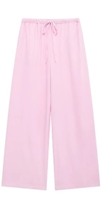 Detailed view of pink linen wide-leg pants with adjustable elastic drawstring waistband