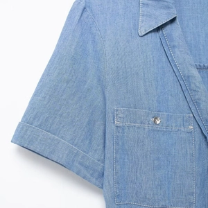 Short sleeve light blue denim midi dress with belted waist and white contrast stitching
