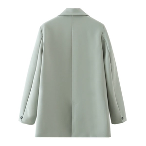 Back view of sage green blazer with center seam, back vent, and black sleeve buttons