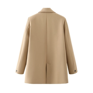 Back view of light grey professional blazer featuring a center vent and structured shoulders