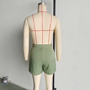 Detailed back view of olive green high-waist wide-leg shorts for women in casual style