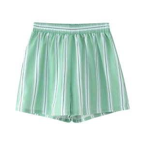 Detail of light green vertical striped shorts with a comfortable elastic waistband