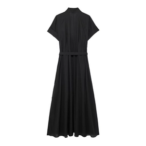 Detailed view of the waist belt and pleated hem on a black short-sleeved maxi dress