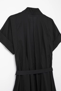 Back view of black short sleeve shirt dress with lapel collar and matching waist belt