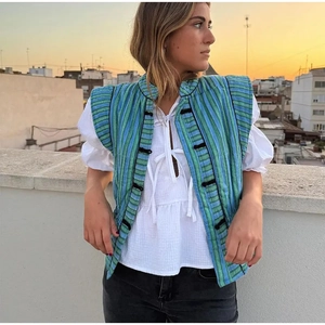 Women's vintage blue and green striped sleeveless quilted vest with frog button closure