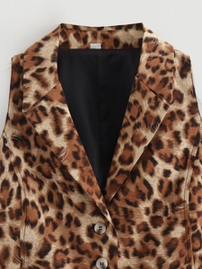 Close-up of leopard print vest showing notch lapel and stylish marble buttons