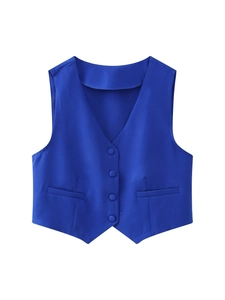 Detail view of royal blue V-neck vest featuring matching buttons and pointed hemline