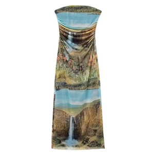 Detail of slim fit tube dress featuring a vibrant nature landscape digital print design