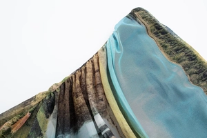 Close-up of ruched mesh fabric with high-definition forest landscape photography print