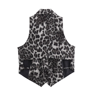 Detail of leopard print vest back featuring adjustable lace-up drawstring and pointed hem