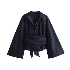 Navy blue poplin lapel shirt with structured wrap tie waist and voluminous wide sleeves