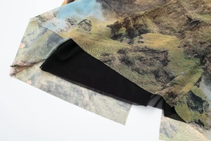 Detail showing dual-layered mesh fabric with artistic oil painting landscape print