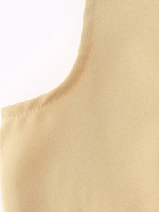 Detailed close-up showing reinforced stitching on durable khaki cotton canvas fabric