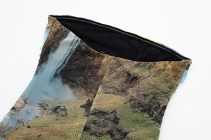 Close-up of digital nature print on mesh fabric dress with neat stitching and lining
