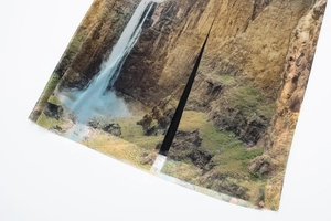 Detailed macro view of the semi-transparent mesh fabric with a natural canyon print