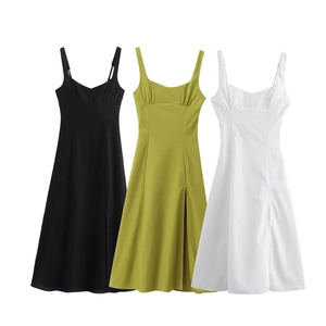 Detail view of linen maxi dresses with spaghetti straps and front slit in three colors