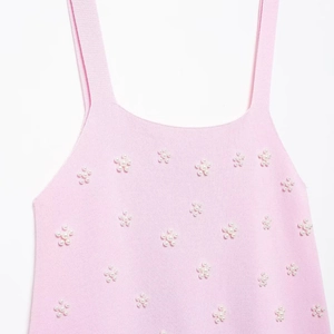 Top caraco rose en maille pour femme avec ornements de fleurs en perles blanches
