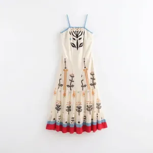 Women's white floral maxi dress with bohemian print and vibrant hemline decoration