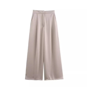 Eleganti pantaloni larghi in raso a vita alta con pieghe da donna in beige champagne