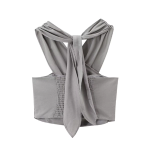 Detail of grey halter neck top with smocked back and front tie bow detail