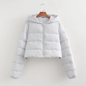 Detailed view of women's short padded jacket featuring adjustable hem drawstrings and hood