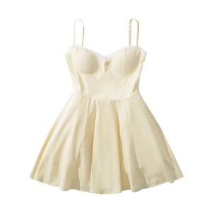 Detailed view of cream lace trim neckline and built-in bra cups on summer slip dress
