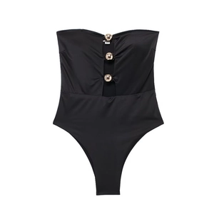 Elegante costume intero a fascia nero con ritagli e tre dettagli sferici dorati