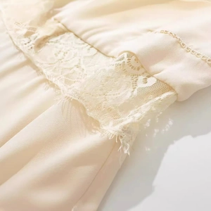 Women summer dress with hollow lace patchwork and ruffled edge in cream white