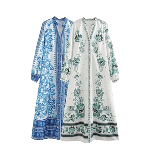 Women's V-neck printed maxi dress featuring bohemian floral patterns in blue and green