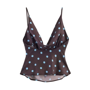 Detail of vintage brown silk camisole with blue polka dots and cowl neckline