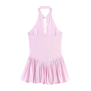 Pink halter neck mini dress with back tie and pleated bubble hem for summer beach vacation