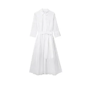 White long-sleeved midi shirt dress with intricate eyelet embroidery and waist tie