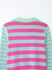 Detail of colorful striped knit top with pink, blue and mint green horizontal bands